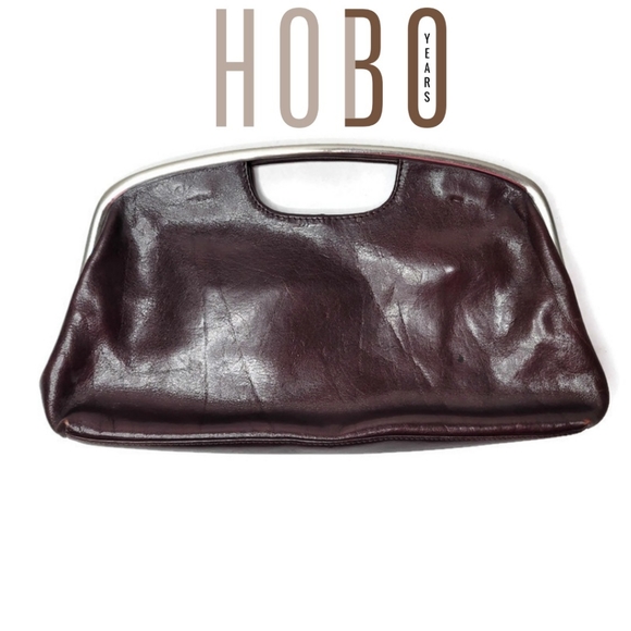 Hobo international leather cognac color clutch handbag. Brown with silver metal. - Picture 1 of 9